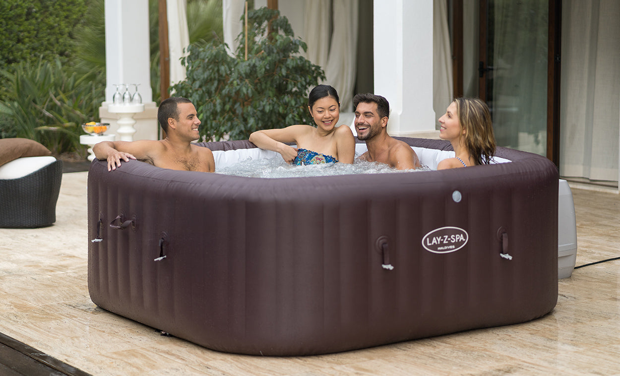 large inflatable square hot tub with seats for 7 people