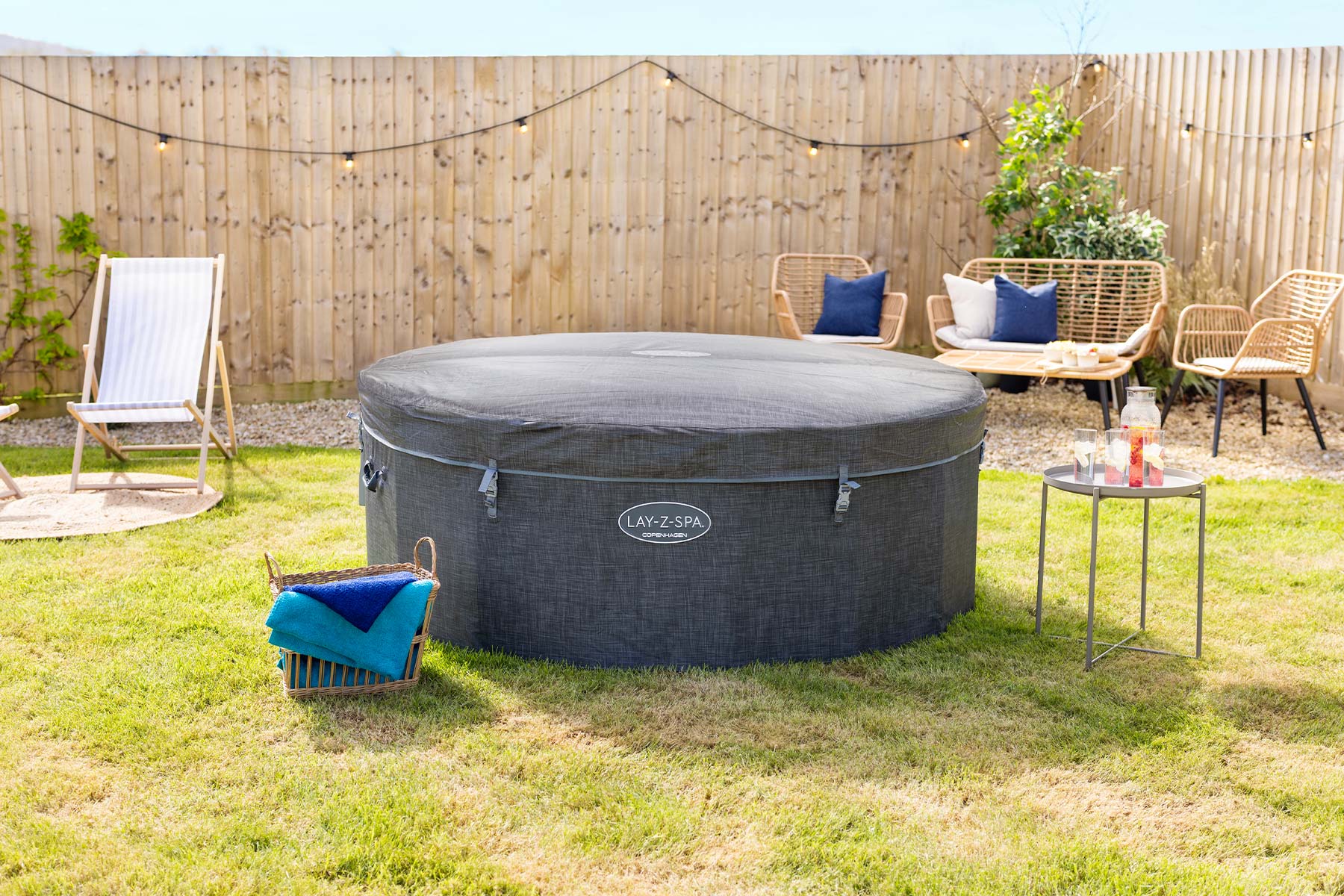 Lay-Z-Spa grey foam hot tub with inflatable lid and protective cover