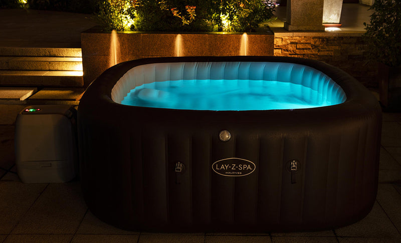 Lay-Z-Spa Maldives HydroJet Pro at night with blue LED lights